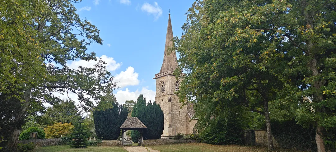 A village church spire in the Cotswolds