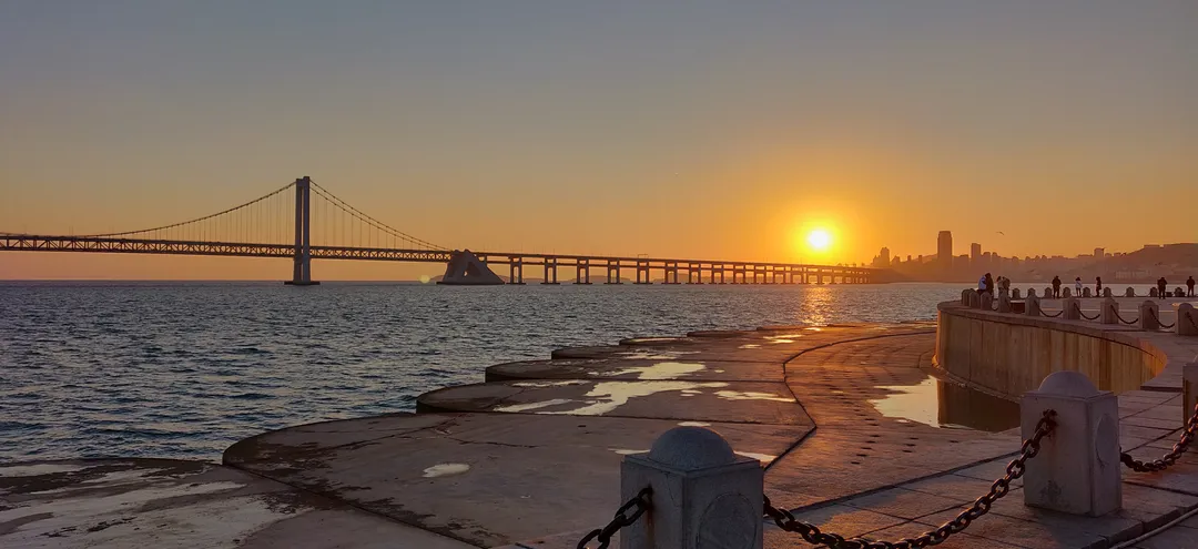 Sunset behind Xinghai Bay Bridge, Dalian