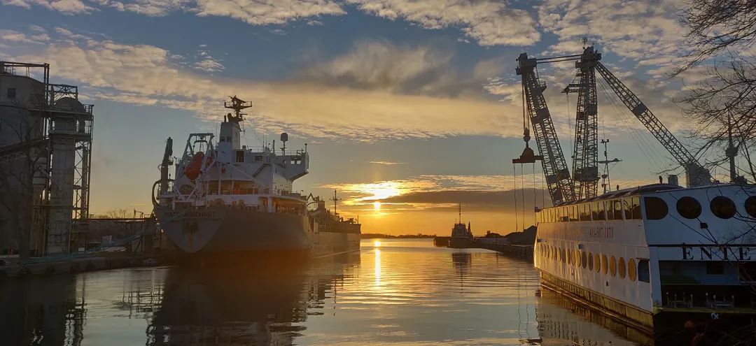 Winter sunset among ships at the Port of Toronto