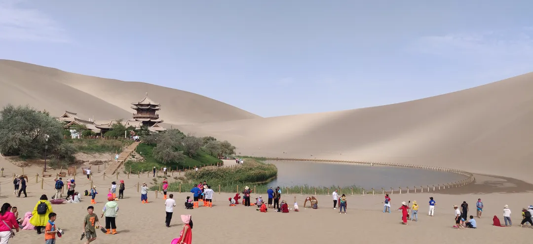 Crescent Lake oasis amid the Mingsha dunes, Dunhuang