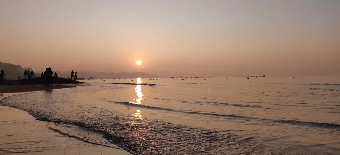Hazy sunrise over the Bohai Sea at Beidaihe