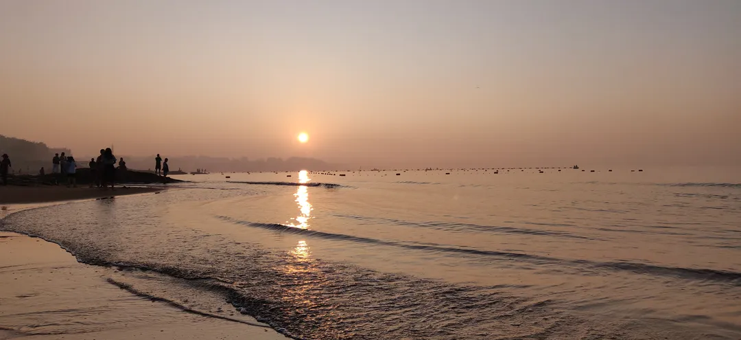 Hazy sunrise over the Bohai Sea at Beidaihe