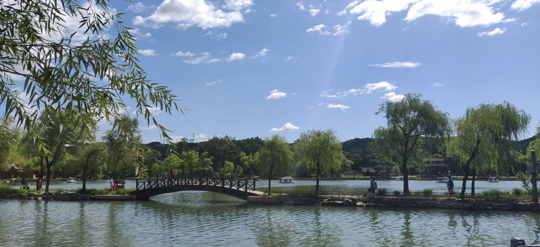 An arched bridge among willows at the Chengde Mountain Resort